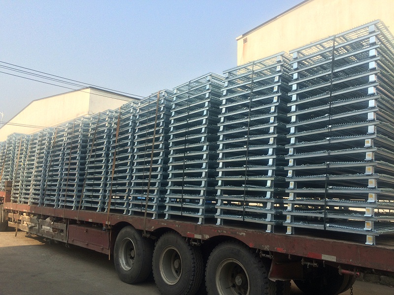 裝貨倉儲(chǔ)籠-折疊式倉儲(chǔ)籠現(xiàn)場(chǎng)實(shí)拍-倉儲(chǔ)籠運(yùn)用廣泛，運(yùn)輸便捷，折疊存放節(jié)省空間-久工倉儲(chǔ)